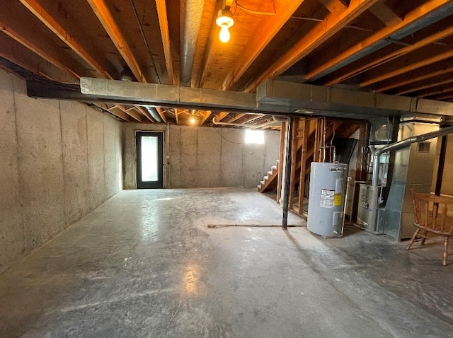 basement with heating unit and water heater