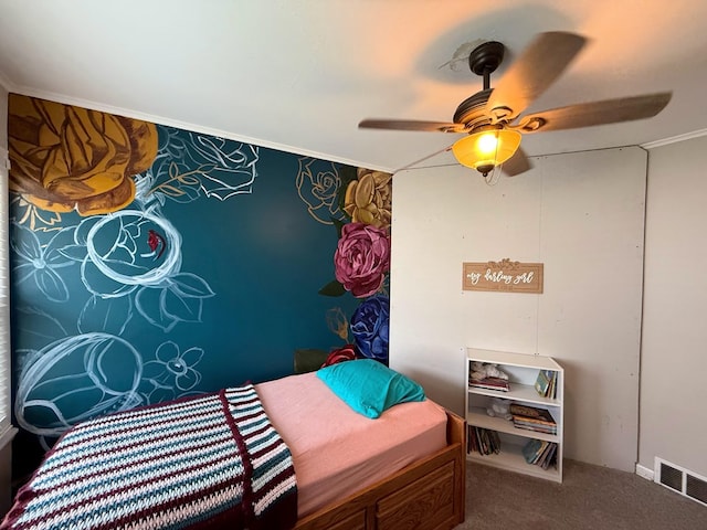 1205 Randolph St, Kirksville, MO 63501 - carpeted bedroom with ceiling fan and ornamental molding