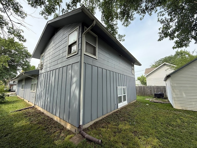 1205 Randolph St, Kirksville, MO 63501 - view of side of home with board and batten siding