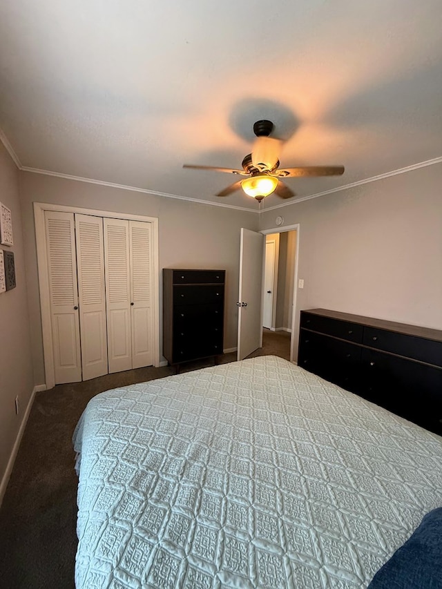1205 Randolph St, Kirksville, MO 63501 - bedroom with dark carpet, a ceiling fan, crown molding, and a closet