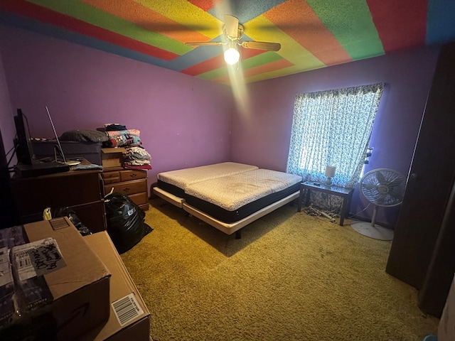 carpeted bedroom with a ceiling fan