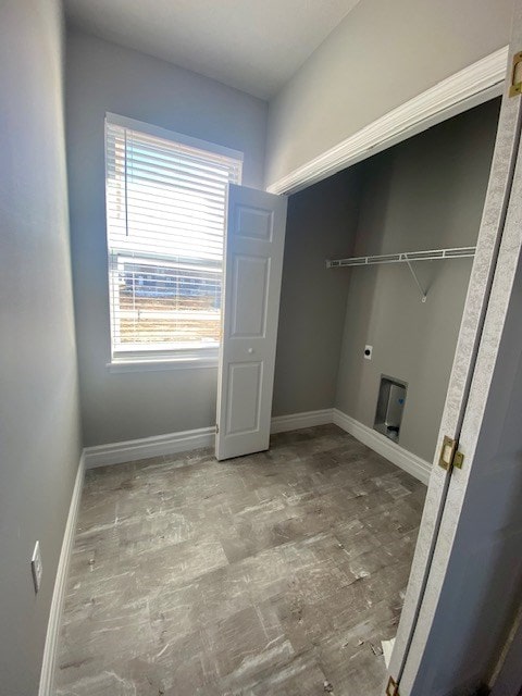 washroom featuring hookup for an electric dryer