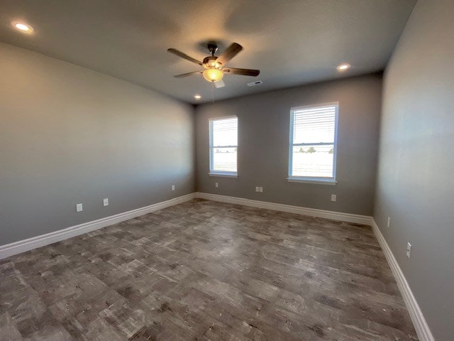 spare room with ceiling fan