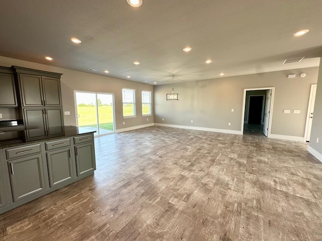 unfurnished living room with light wood-type flooring