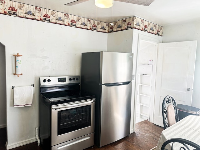 kitchen with ceiling fan, appliances with stainless steel finishes, and dark wood-style floors