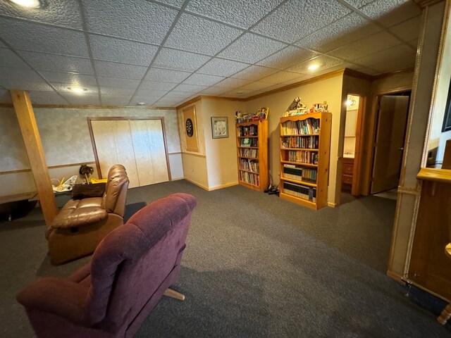 14695 Motter Hill Rd, Kirksville, MO 63501 - living room featuring a drop ceiling, baseboards, crown molding, and carpet flooring