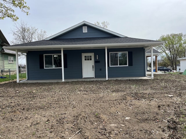 1216 N Franklin St, Kirksville, MO 63501 - bungalow featuring roof with shingles and a porch