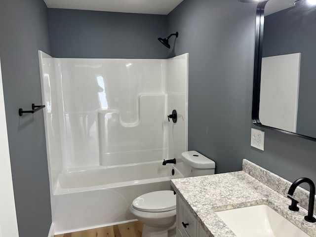 1216 N Franklin St, Kirksville, MO 63501 - bathroom with toilet, shower / bathing tub combination, vanity, and wood finished floors