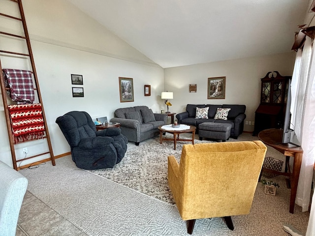 living room featuring lofted ceiling