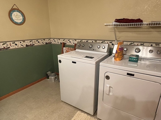 laundry room with separate washer and dryer