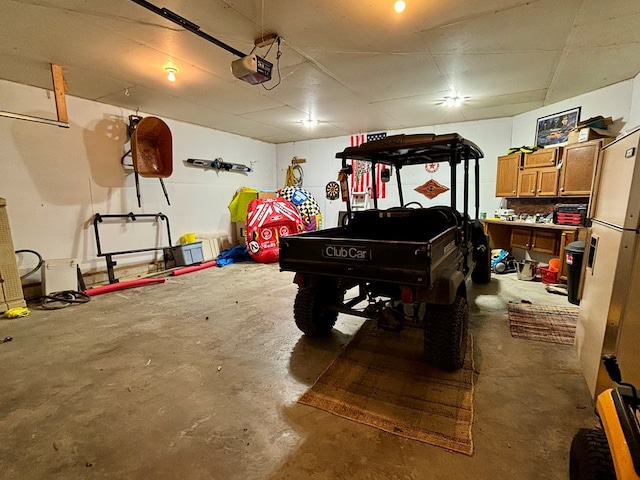 garage featuring a garage door opener