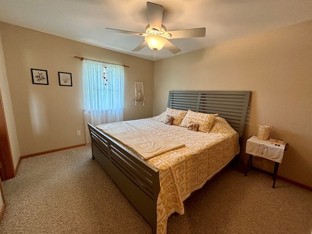 bedroom featuring ceiling fan and light carpet