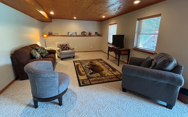 carpeted living room with wood ceiling