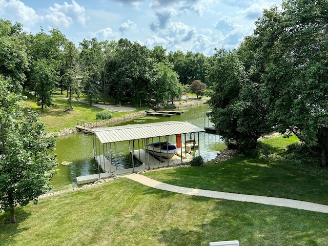 dock area featuring a water view and a yard