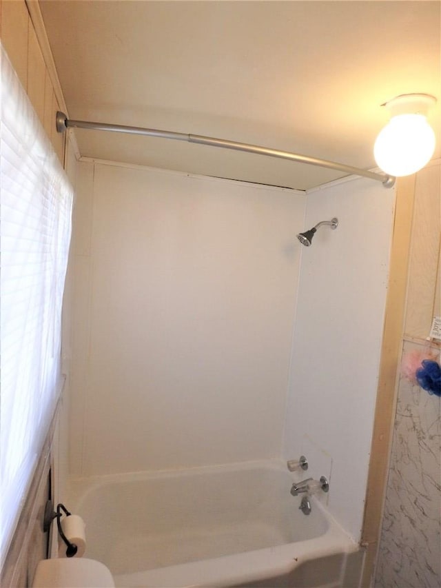 bathroom featuring shower / washtub combination