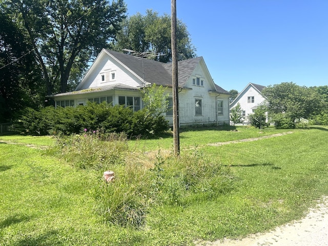 110 Van Buren St, Browning, MO 64630 - view of property exterior with a yard