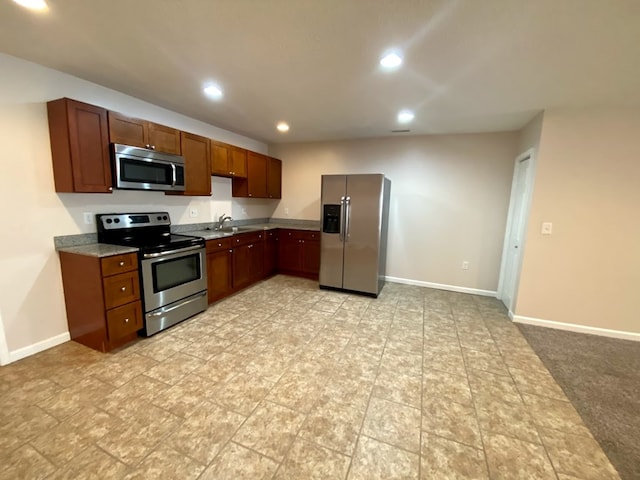 kitchen with stainless steel appliances and sink