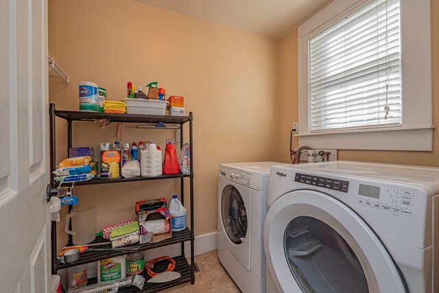 washroom with separate washer and dryer