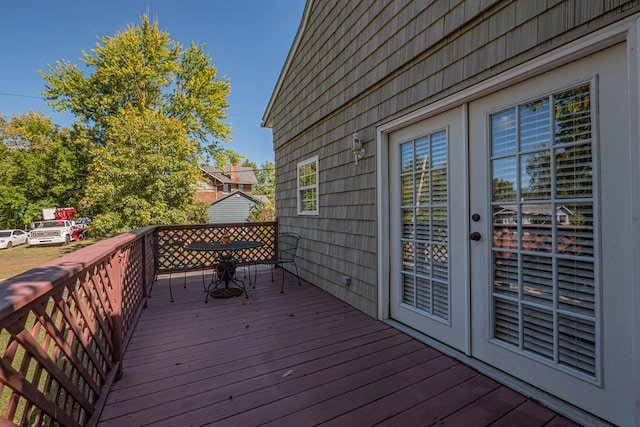 wooden deck featuring french doors