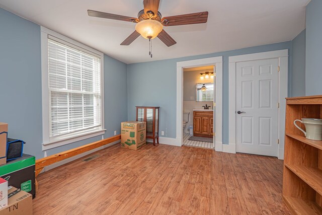 rec room featuring ceiling fan and light hardwood / wood-style flooring