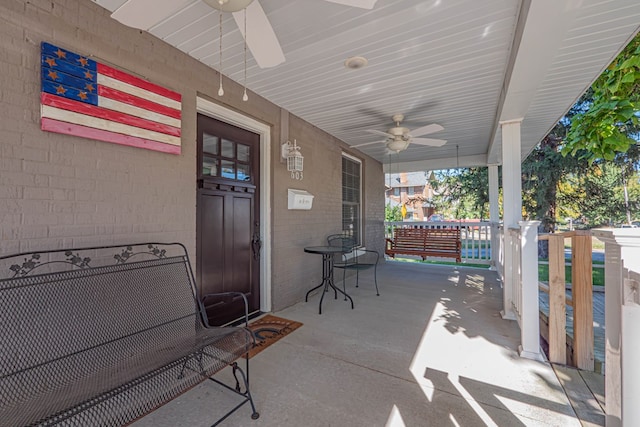 view of patio / terrace with ceiling fan and a porch