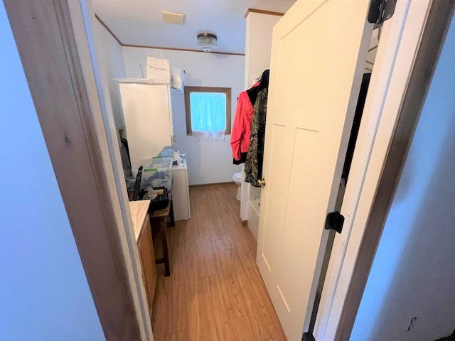 hallway featuring light hardwood / wood-style flooring