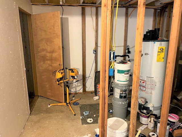 utility room featuring water heater