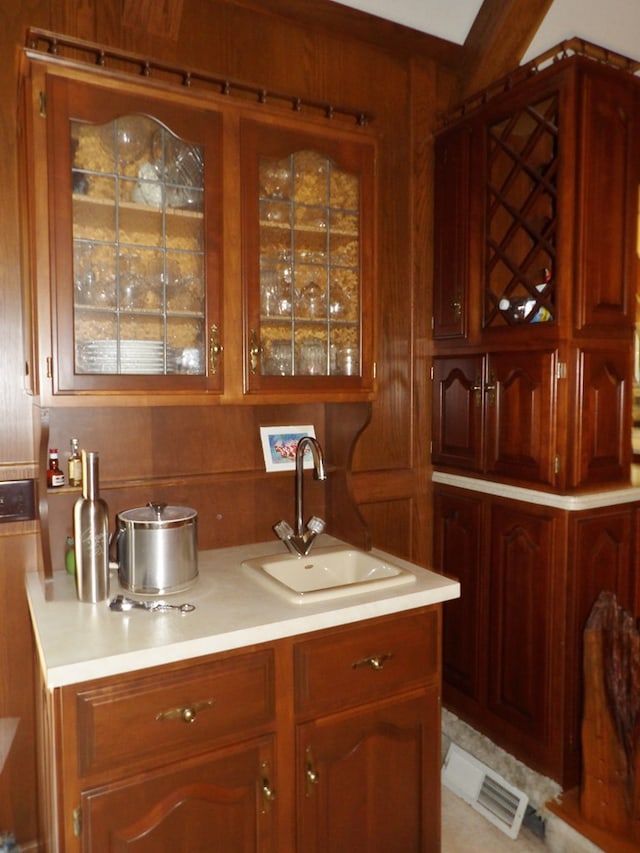 bar with wood walls and sink