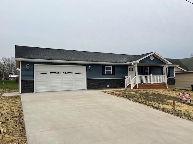 506 E Mill St, Kirksville, MO 63501 - single story home featuring driveway, a garage, and a porch