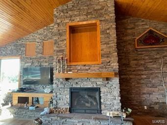 unfurnished living room featuring a fireplace, wood ceiling, and lofted ceiling