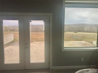 doorway to outside featuring french doors