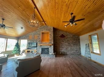 unfurnished living room featuring a fireplace, dark wood-type flooring, ceiling fan, and wooden ceiling