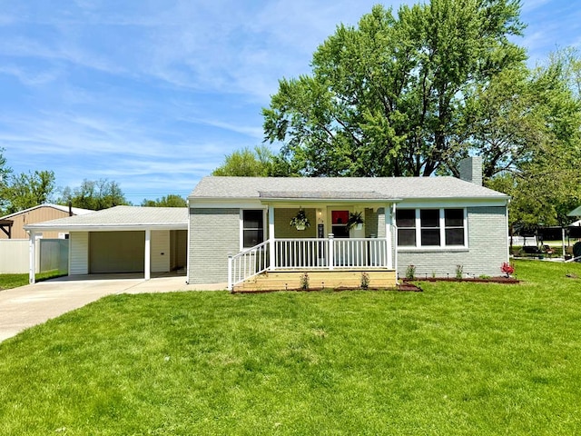 713 E Dear St, Kirksville, MO 63501 - single story home featuring a porch, a chimney, brick siding, and driveway