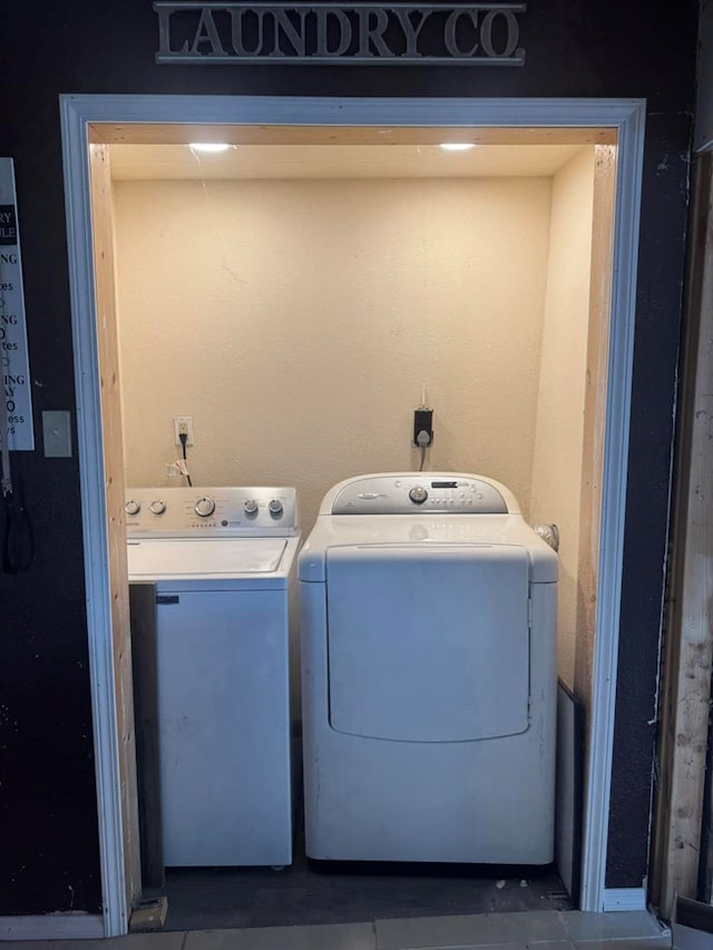 228 S Vine St, Milan, MO 63556 - laundry area with independent washer and dryer