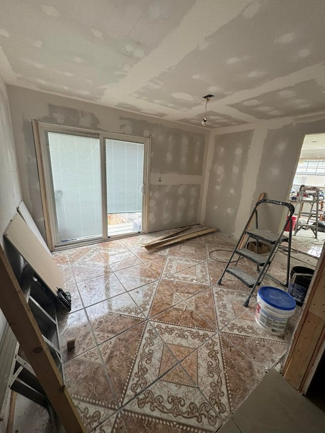 228 S Vine St, Milan, MO 63556 - empty room featuring tile patterned floors