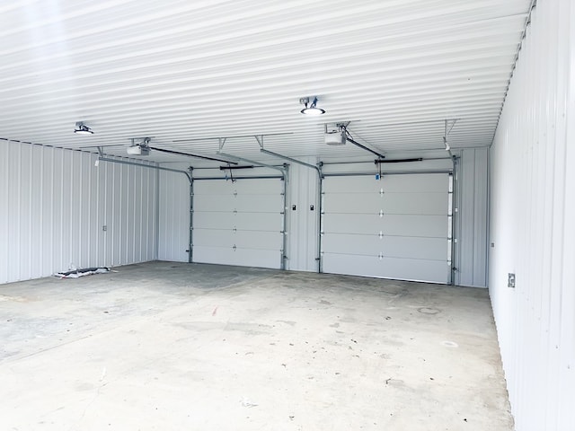 garage featuring a garage door opener