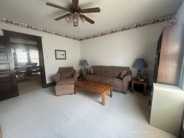 337 Calhoun St, Chillicothe, MO 64601 - carpeted living room featuring a ceiling fan