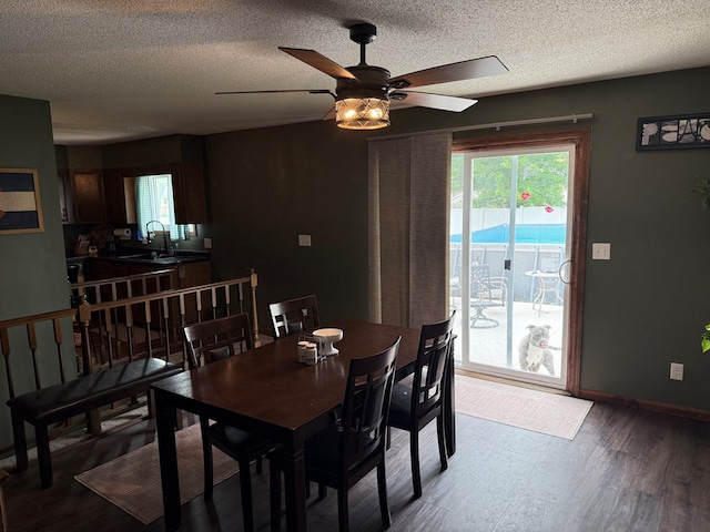 2515 N E St, Kirksville, MO 63501 - dining room with a ceiling fan, wood finished floors, a textured ceiling, and baseboards