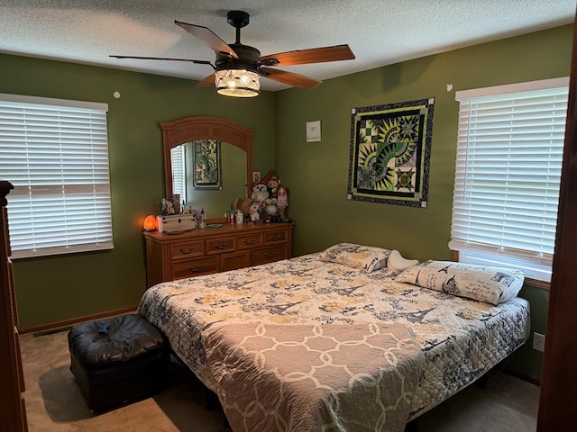 2515 N E St, Kirksville, MO 63501 - bedroom featuring carpet floors, a ceiling fan, and a textured ceiling