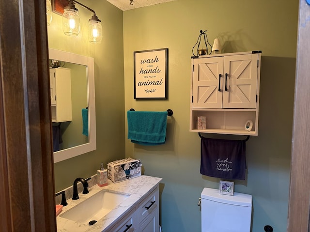 2515 N E St, Kirksville, MO 63501 - bathroom with vanity and toilet