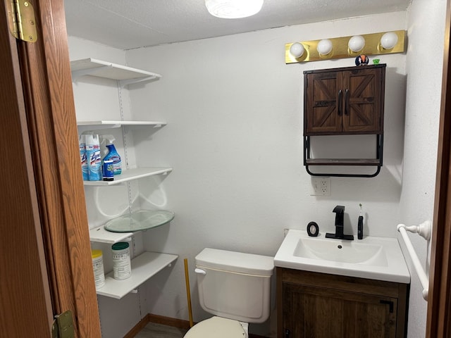 2515 N E St, Kirksville, MO 63501 - bathroom featuring vanity and toilet