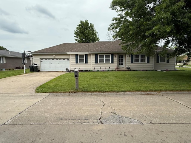 2515 N E St, Kirksville, MO 63501 - single story home with a garage, a front lawn, and concrete driveway