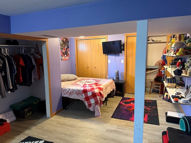 2515 N E St, Kirksville, MO 63501 - bedroom with two closets and wood finished floors
