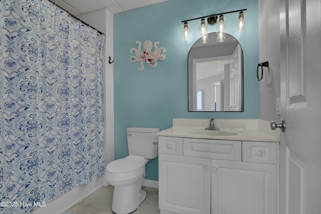 full bathroom featuring tile patterned flooring, vanity, baseboards, toilet, and shower / bathtub combination with curtain