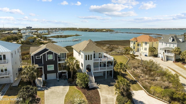 bird's eye view with a water view