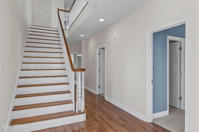 stairs with dark carpet