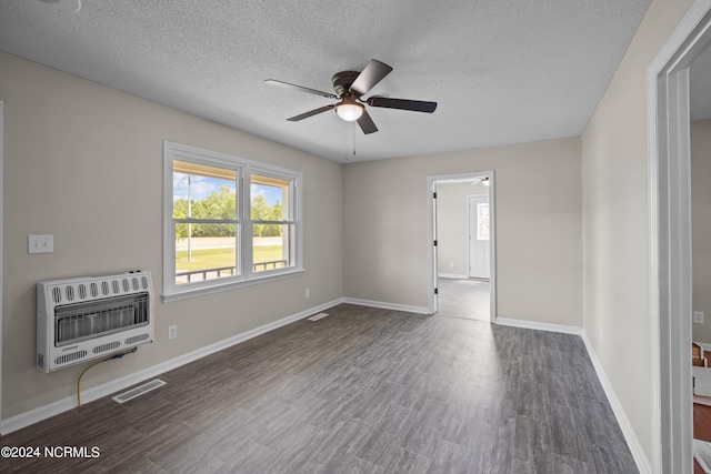 unfurnished room featuring a textured ceiling, ceiling fan, and dark wood-type flooring