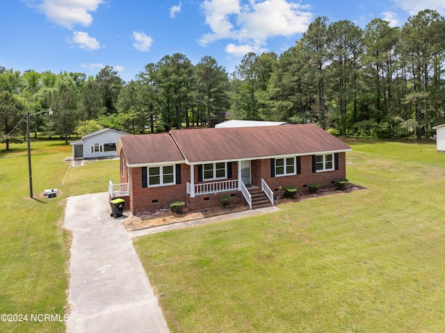 single story home with a front yard