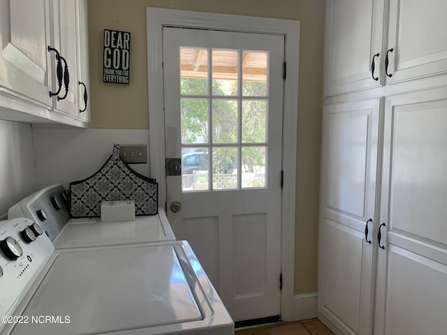 101 Spruce St, Washington, NC 27889 - laundry area featuring washing machine and clothes dryer and cabinet space