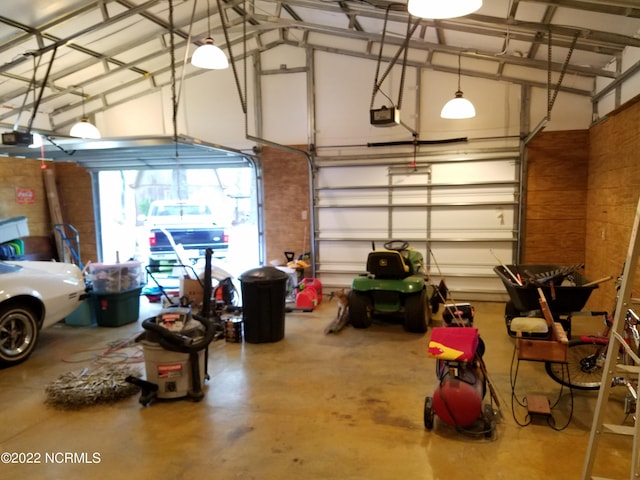 garage featuring a garage door opener